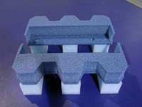 Foam pallet with energy and impact absorbing foam